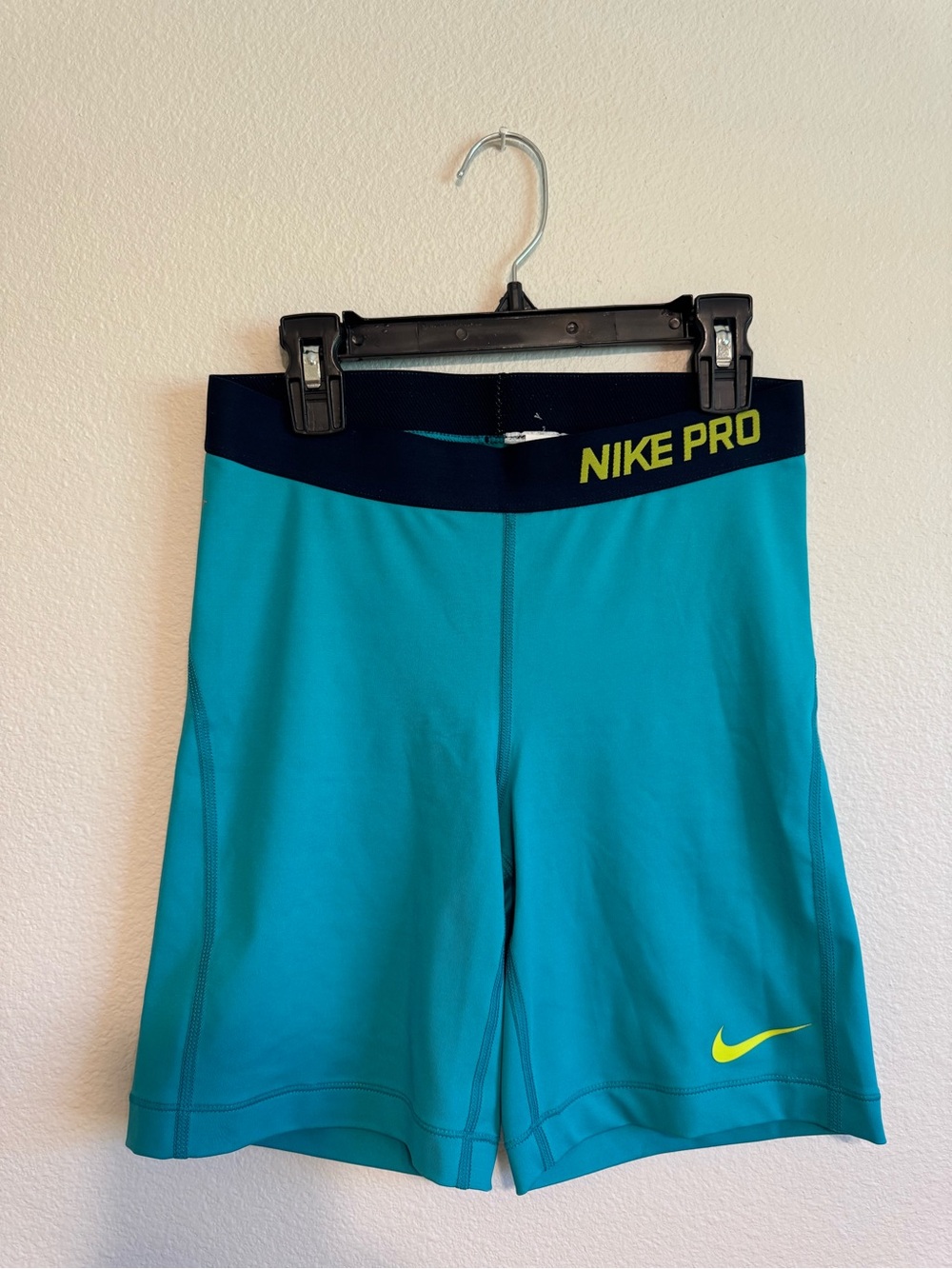 Nike Pro Teal Compression Shorts with Navy Waistband and Yellow Stitching